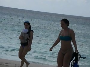 Spying on a curvy sizzling teen bikini lady
