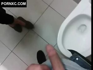 Redhead with glasses dick sucking in public toilet