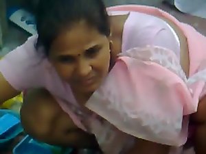Pinkish saree aunty washing clothes 02