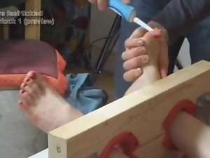 Claire's feet tickled on the stocks