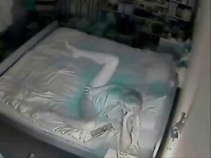 My slutty mom masturbating on bed .Hidden cam